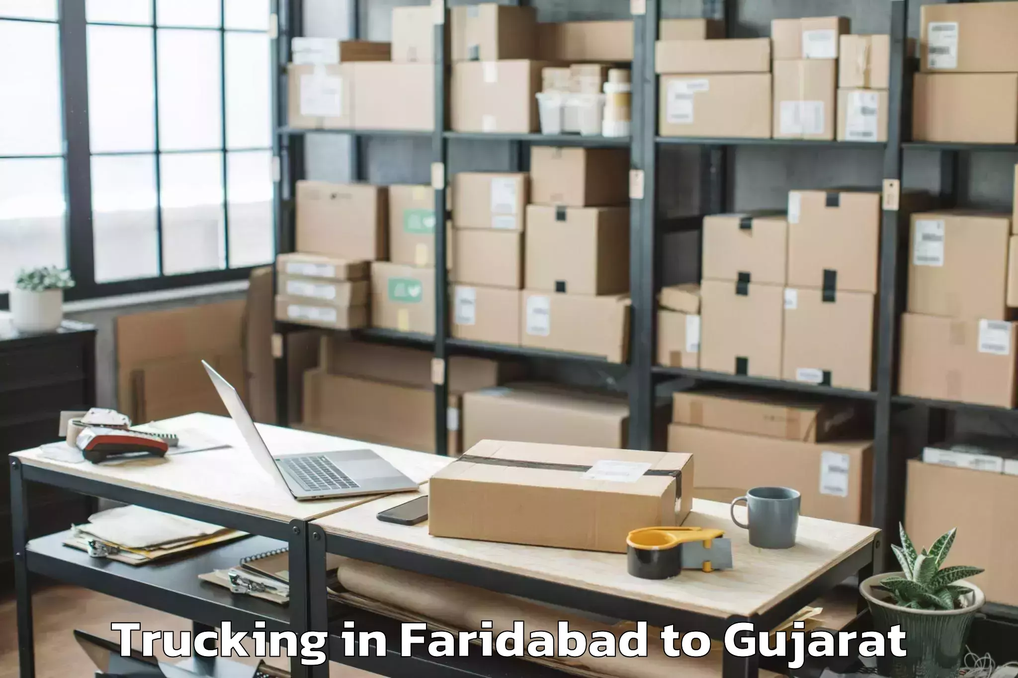 Faridabad to Kodinar Trucking Booking